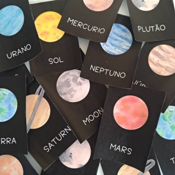 Preview of *Portuguese* Planetas em aquarela, com o sol, a lua e plutão.