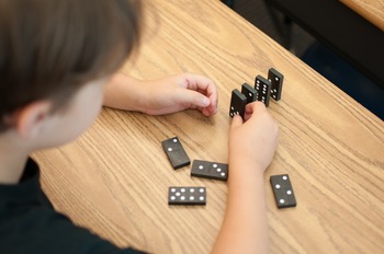 Preview of Stock Photo: Student with Dominos #3 -Personal & Commercial Use