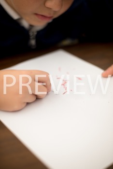 Preview of Stock Photo:Student Erasing Mistakes #2-Personal & Commercial Use