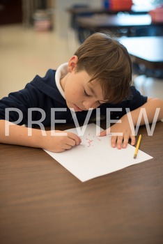 Preview of Stock Photo: Student Erasing Mistakes #1-Personal & Commercial Use