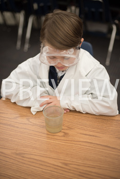 Preview of Stock Photo: Student Scientist Experimenting-Personal & Commercial Use