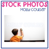 Stock Photo: Student Writing on a Whiteboard-Personal & Co